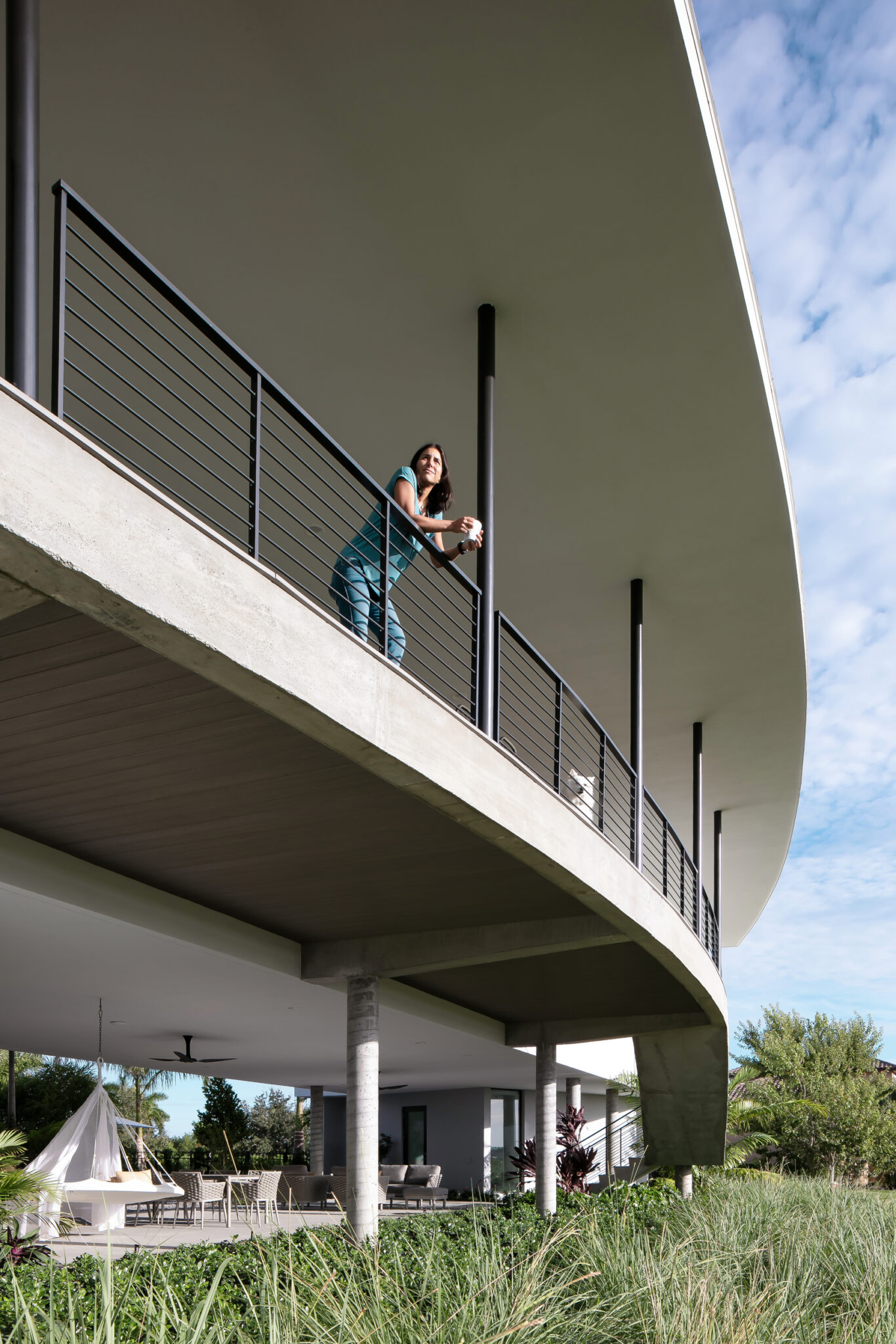 Curved balcony edge of Palma Sola Modern seen from below
