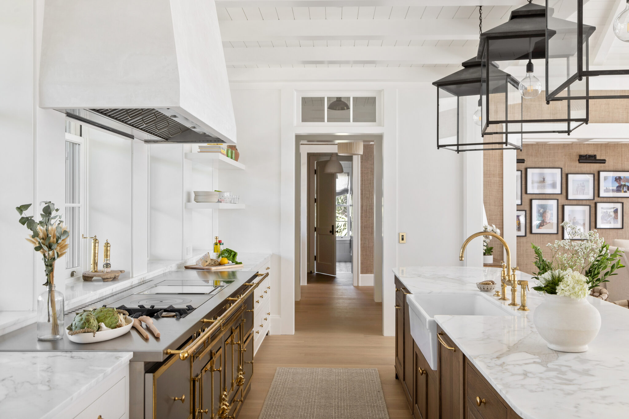 Kitchen range wall with a plaster hood and marble counters