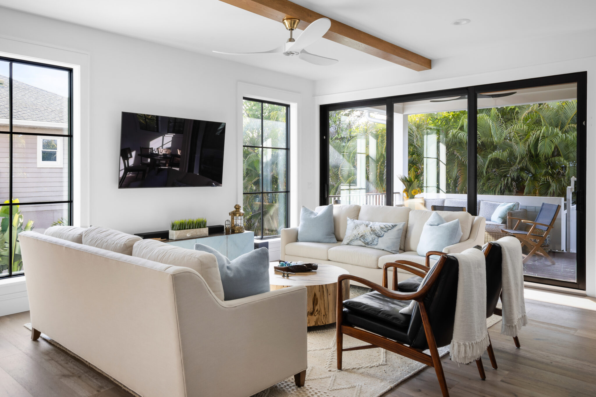Living room with sliding glass doors to a porch
