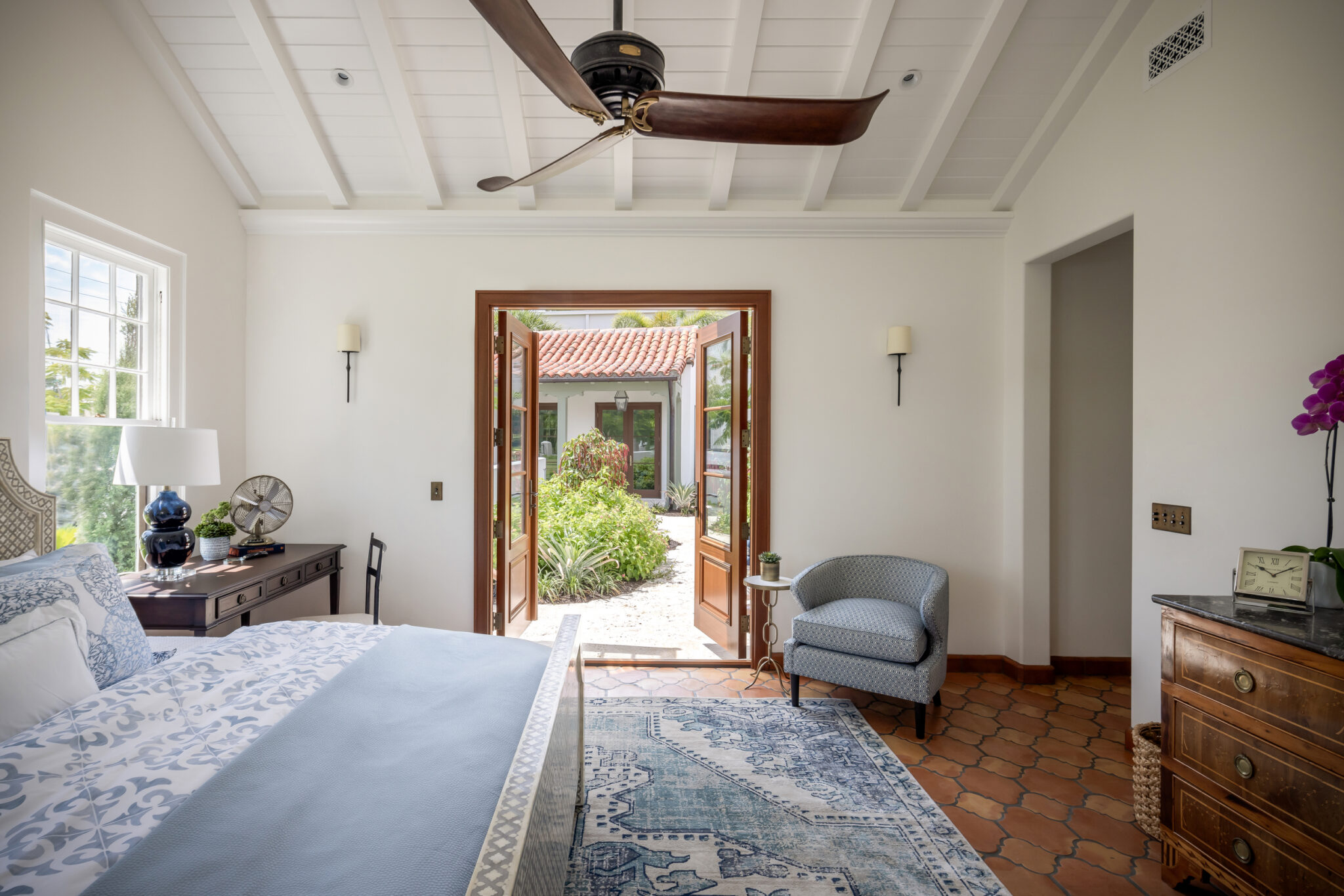 Bedroom with French doors to the courtyard