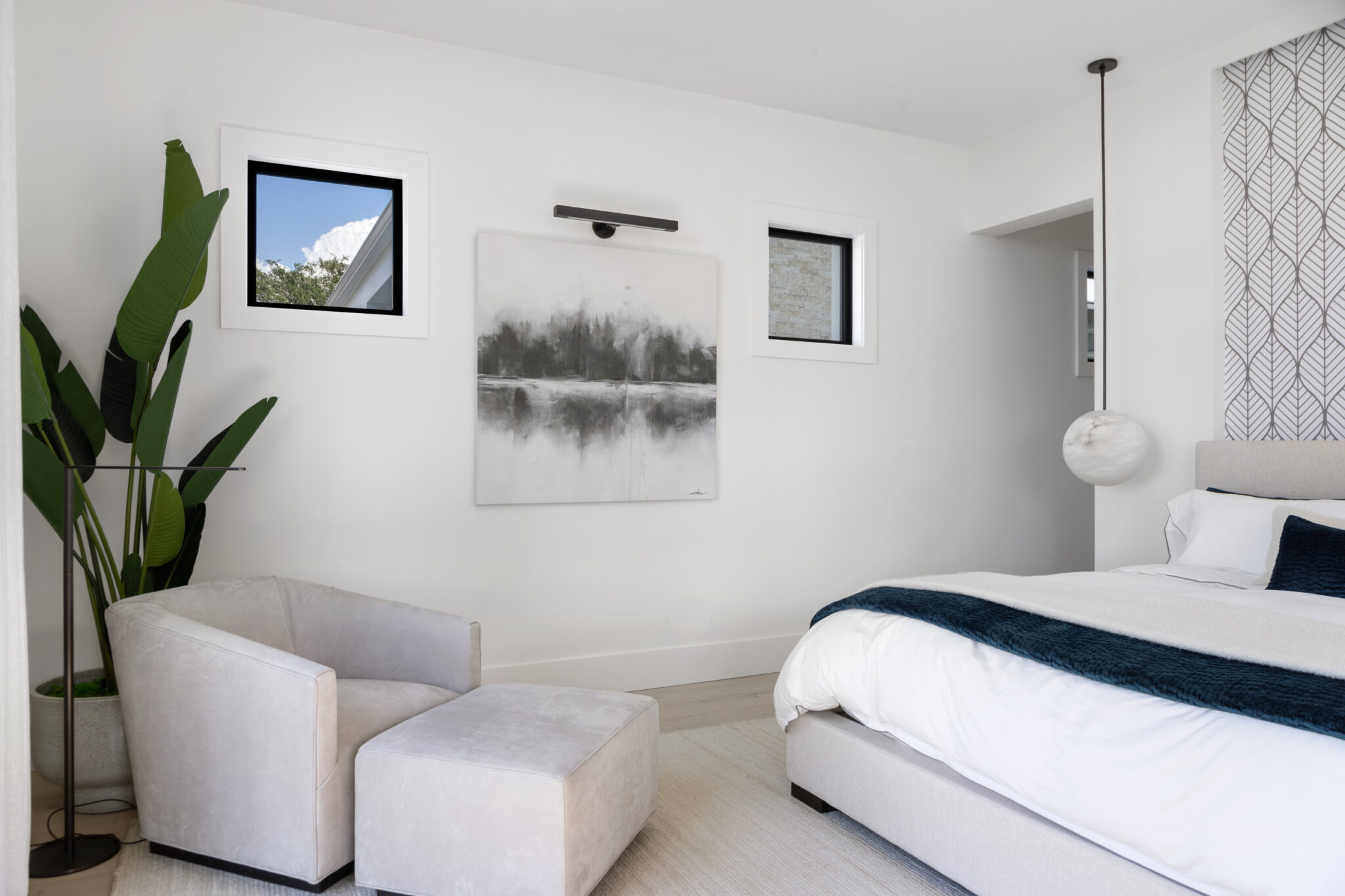 Bedroom sitting corner with a lounge chair and ottoman