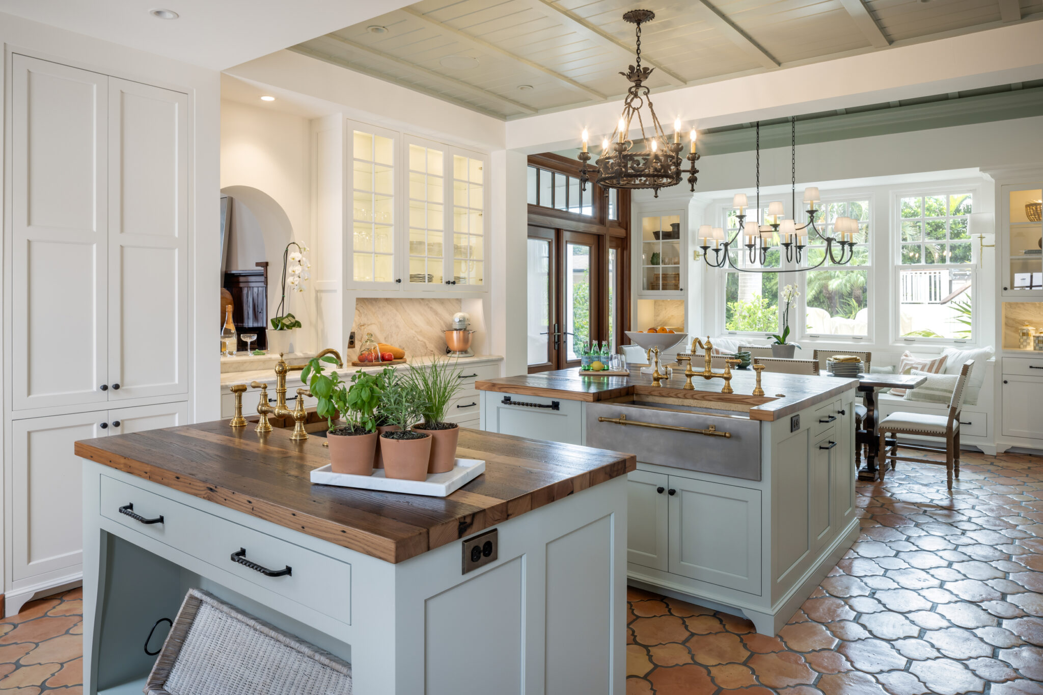 Kitchen with a butcher-block island and plaster range hood