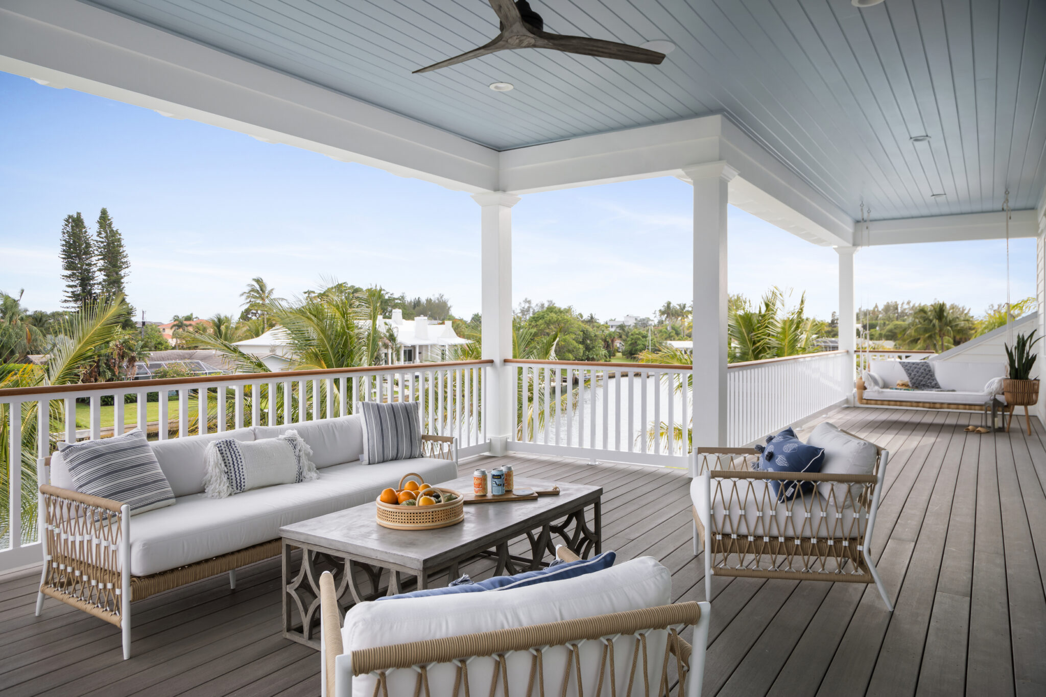 Covered balcony seating with canal views