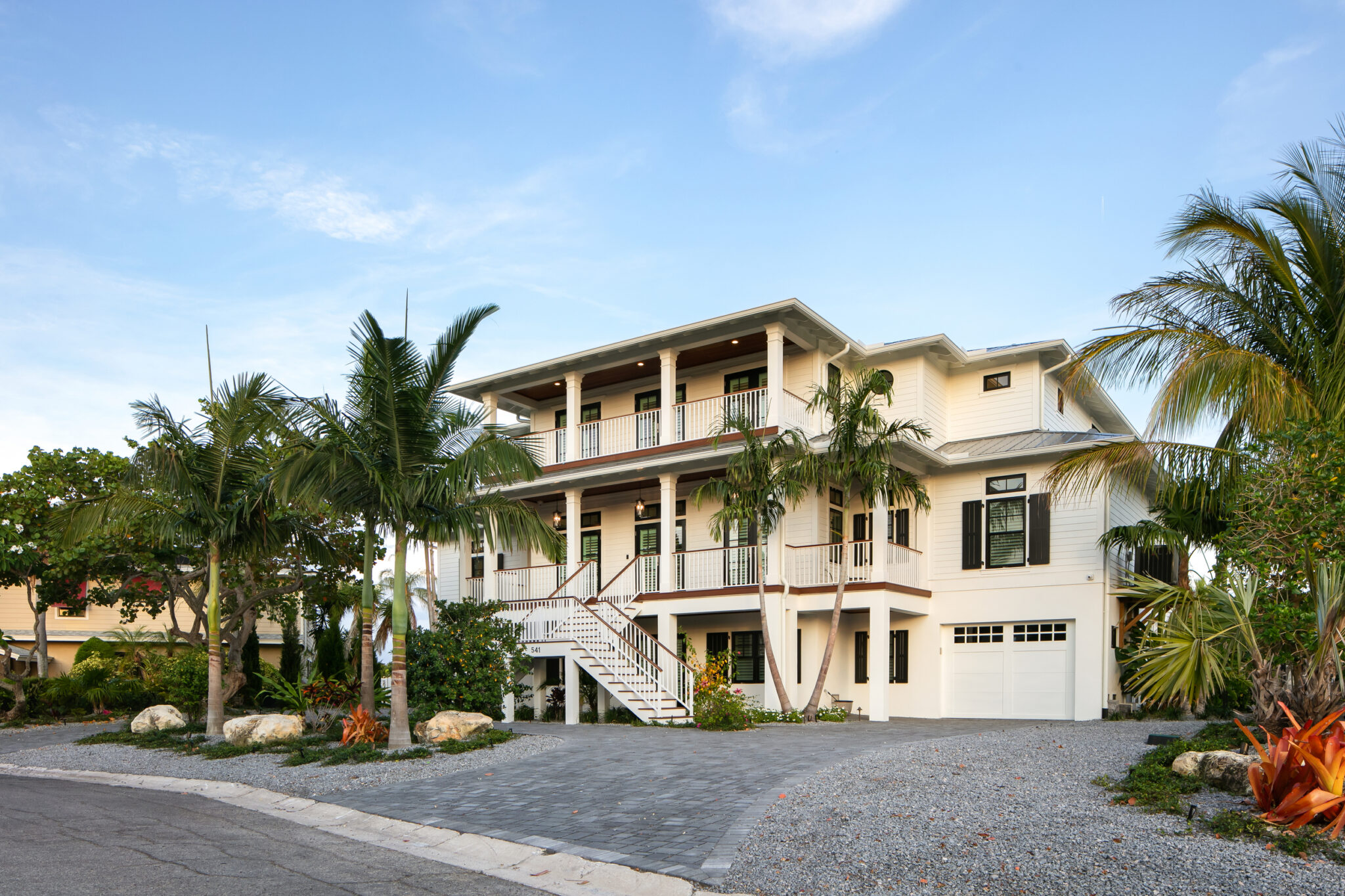 Coastal Haven exterior stair and porches above the garage