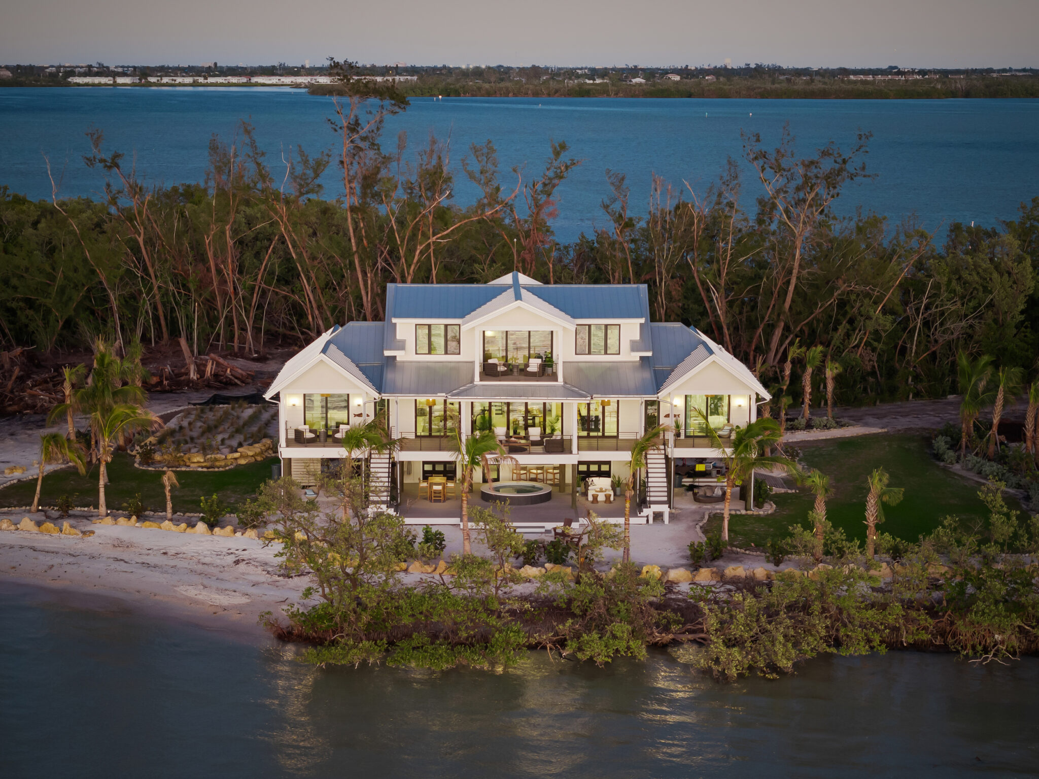 Aerial view of the Jewfish Key Residence surrounded by the bay