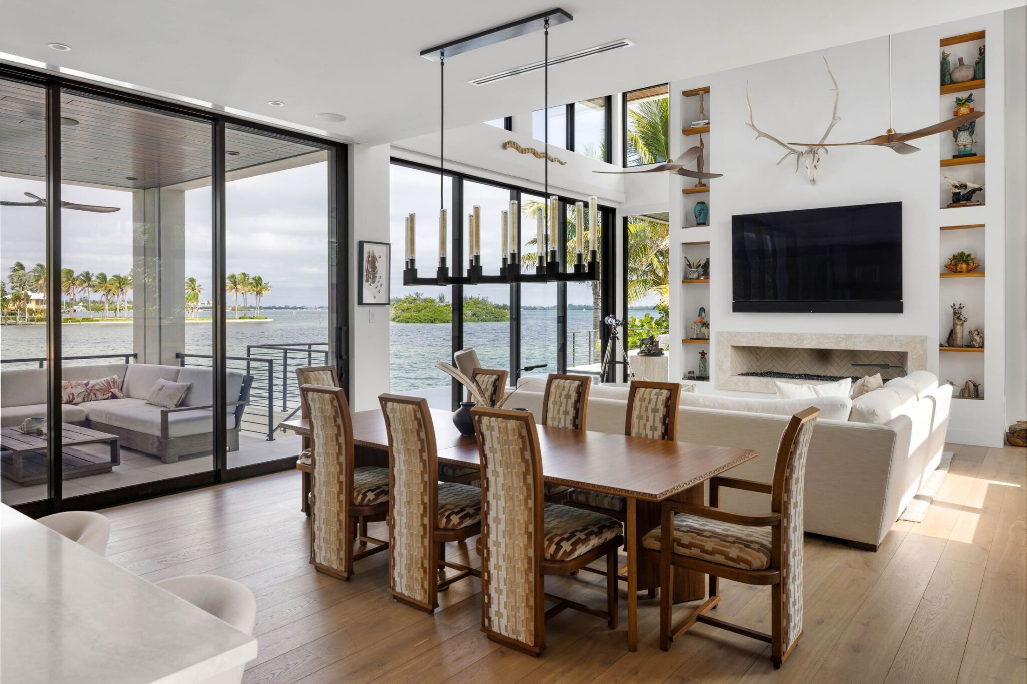 Dining room looking through floor-to-ceiling glass to the bay and mangrove islands