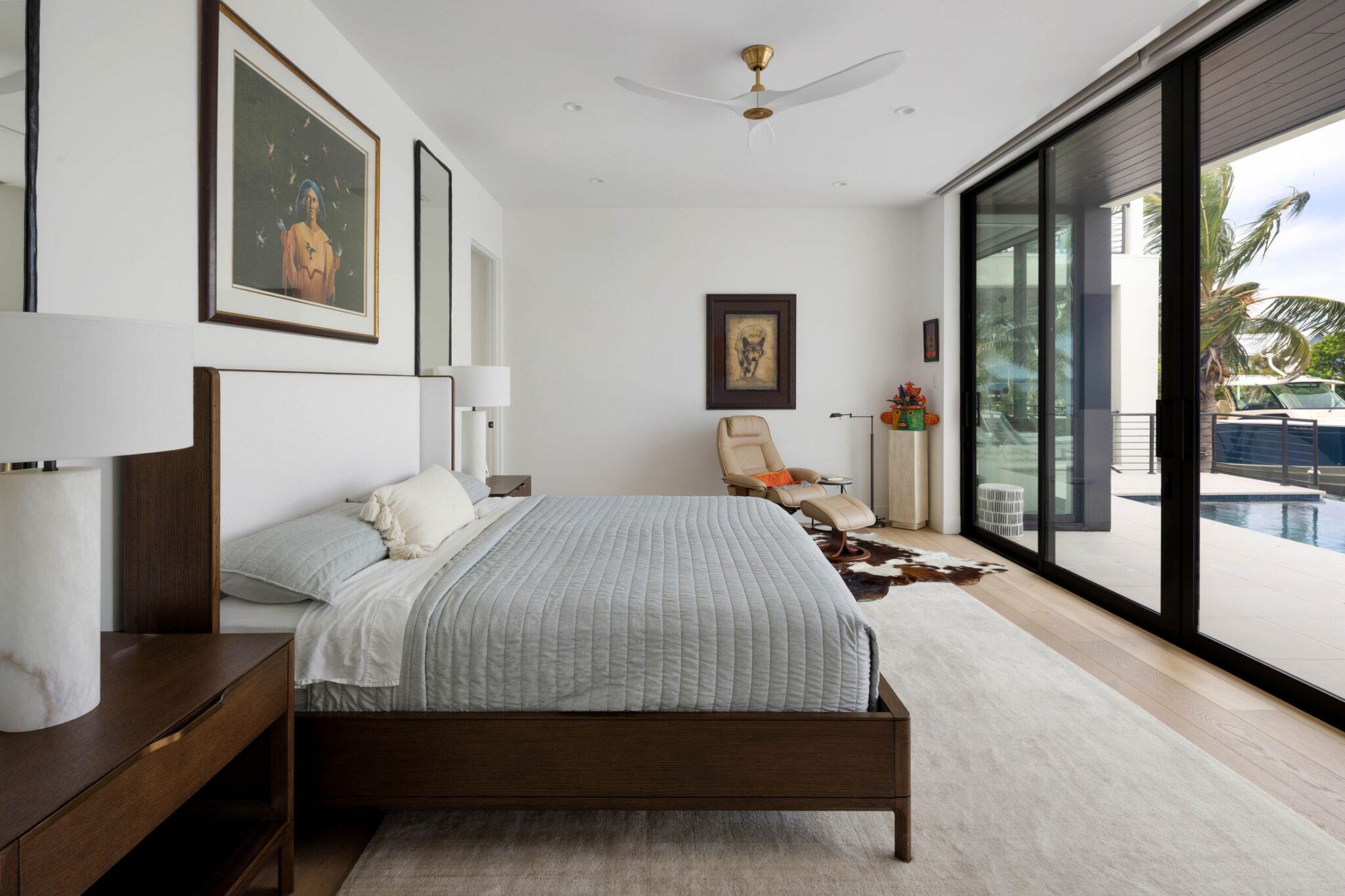 Bedroom with sliding glass doors to the pool terrace