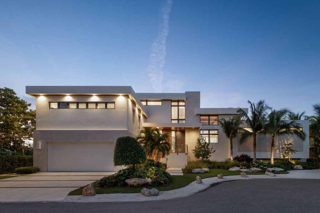 Front of Bayview Residence at dusk with landscape lighting