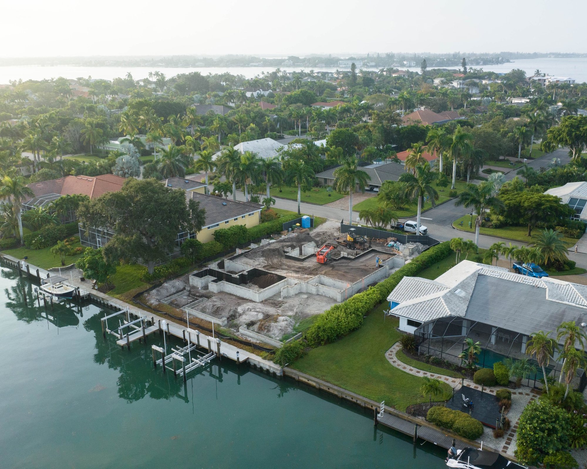 Aerial view from the canal of the foundation walls, with Sarasota Bay beyond