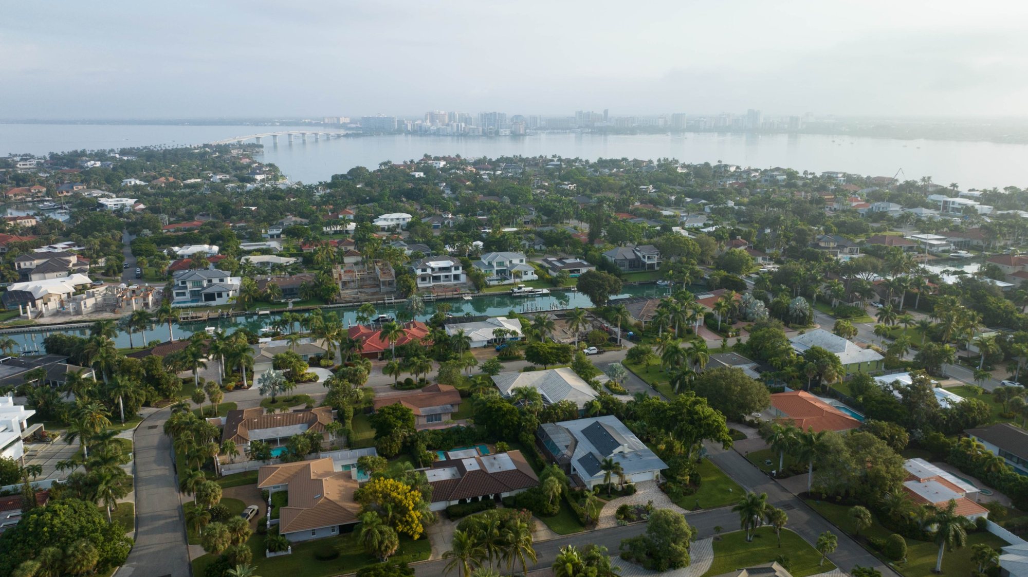 Wide aerial view across Bird Key to the Ringling Bridge and downtown Sarasota