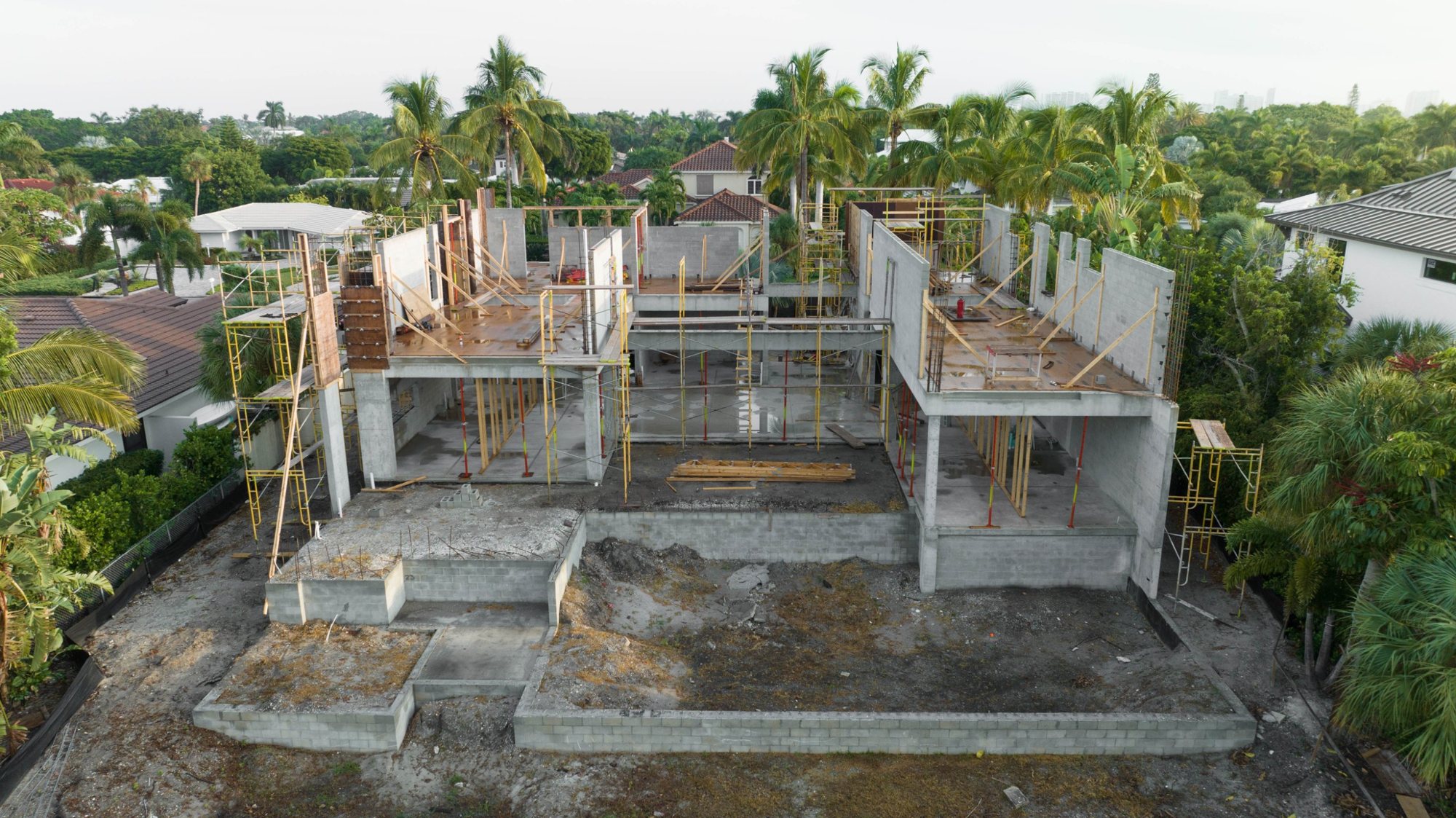 Aerial view from the canal of the concrete first floor and shored slab