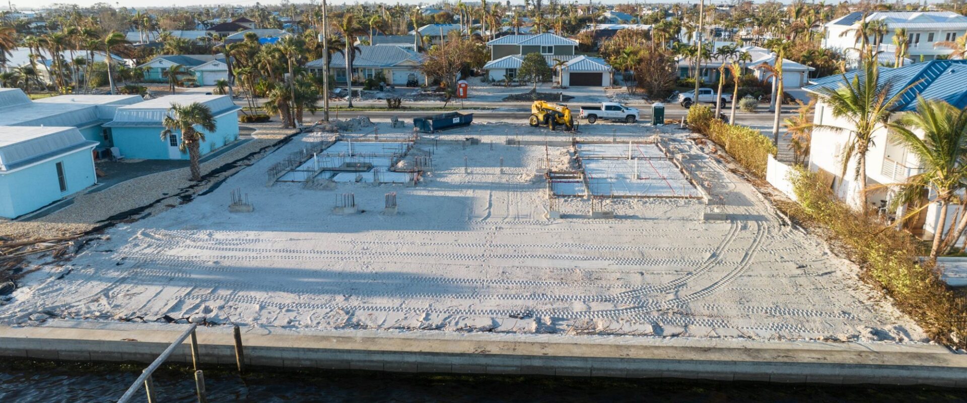 Aerial view from the canal of the foundation formed on the waterfront lot