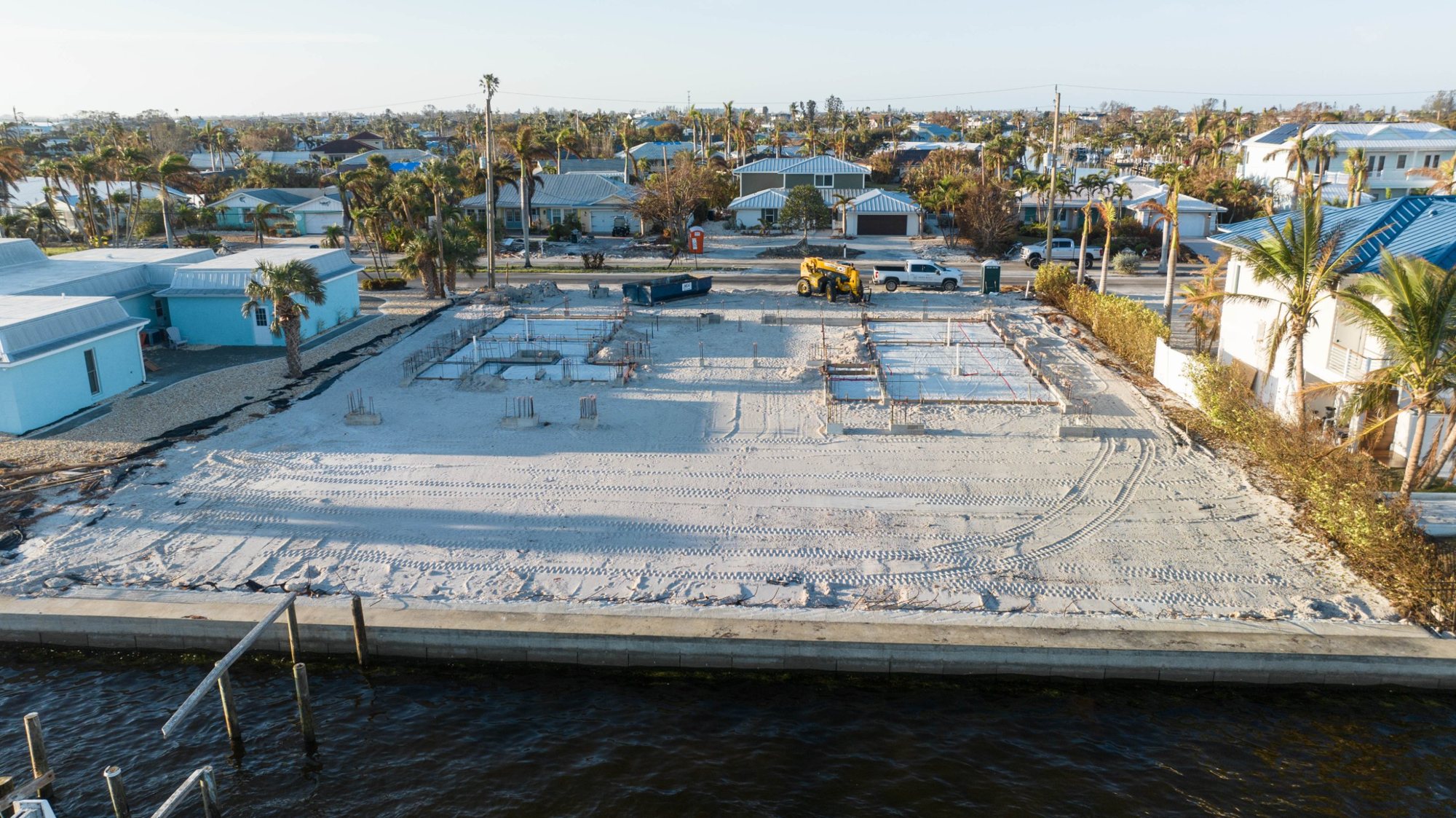 Aerial view from the canal of the foundation formed on the waterfront lot