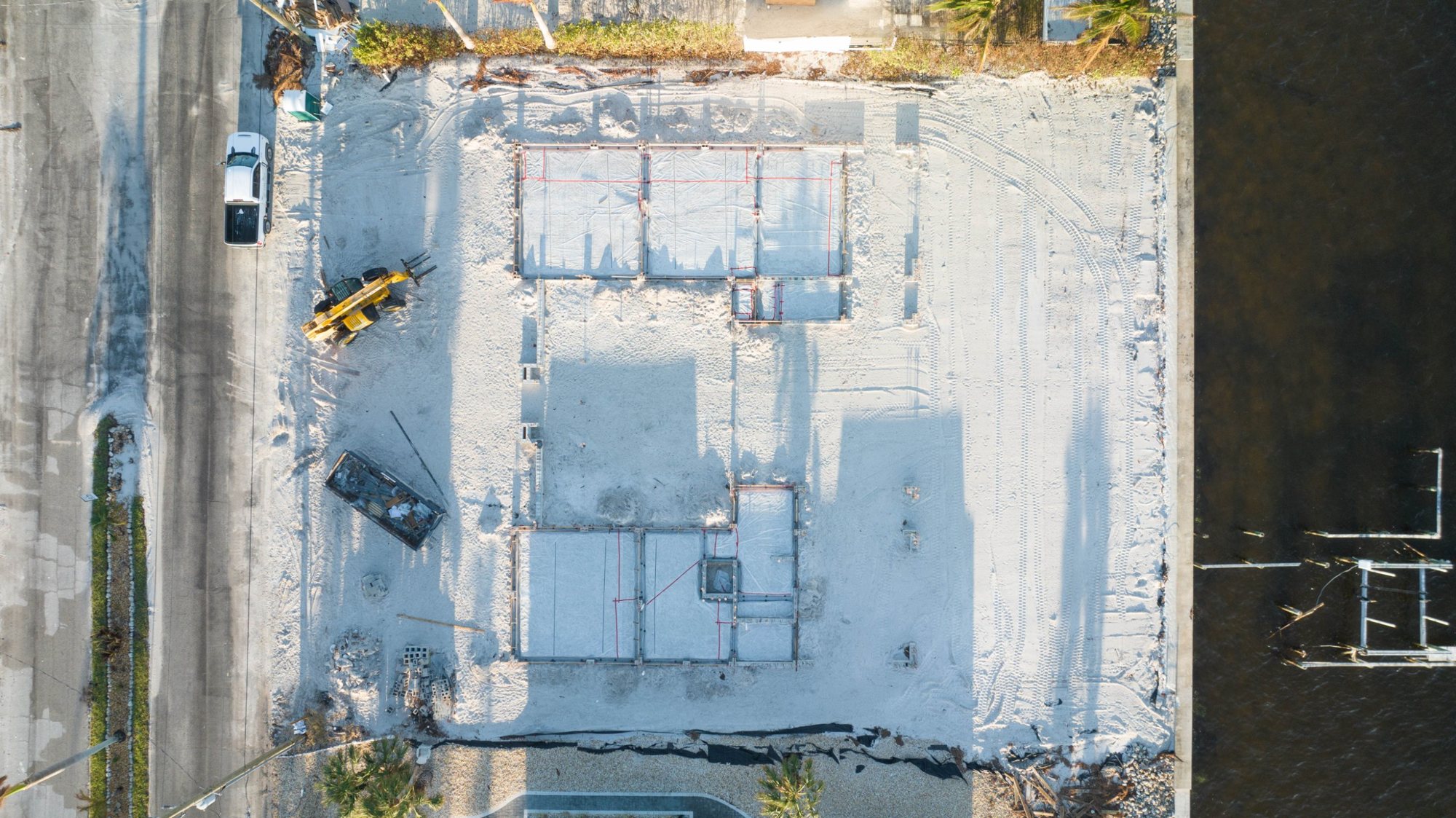 Overhead view of the foundation forms between the street and the seawall