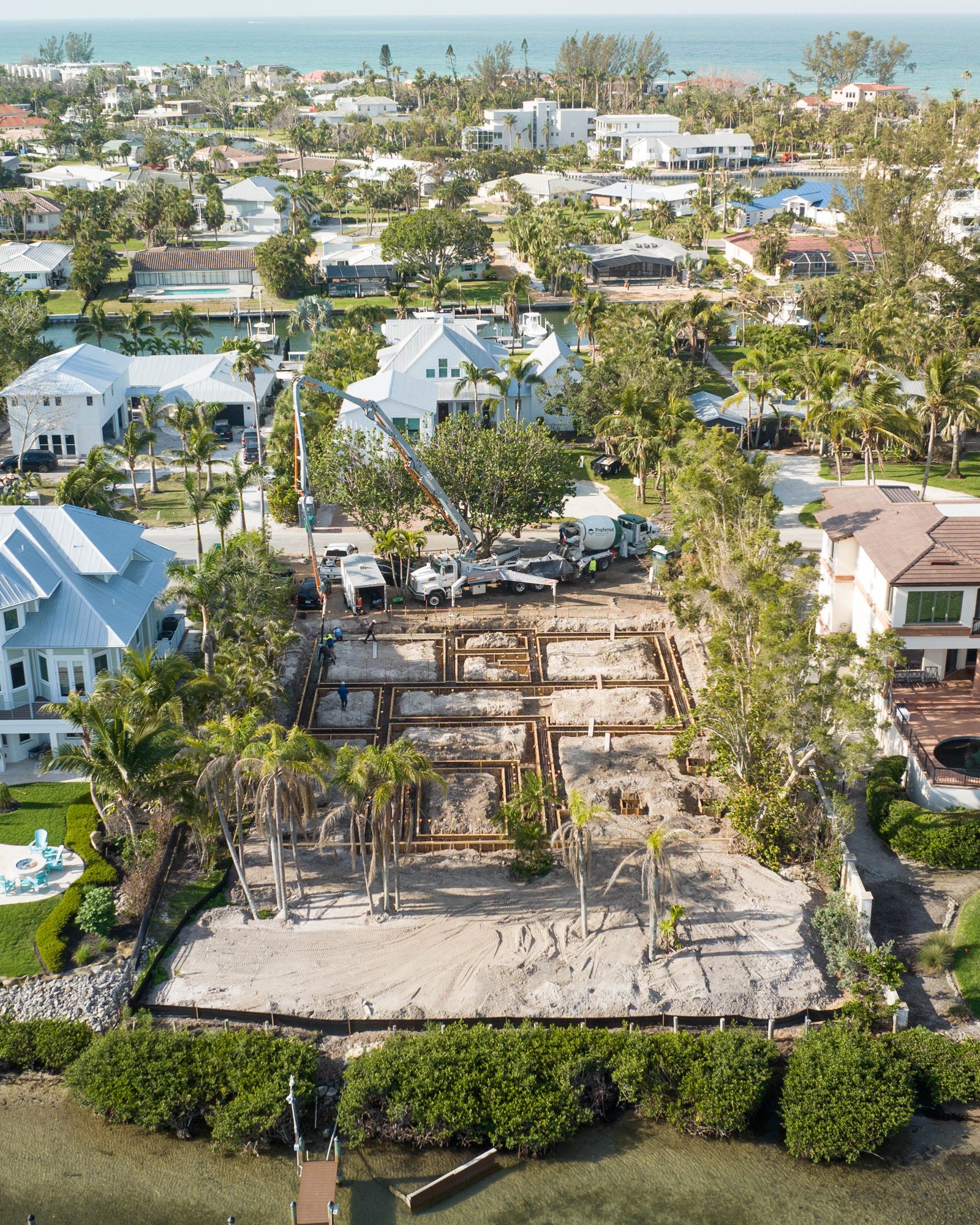 Aerial view of the foundation pour, with the Gulf in the distance