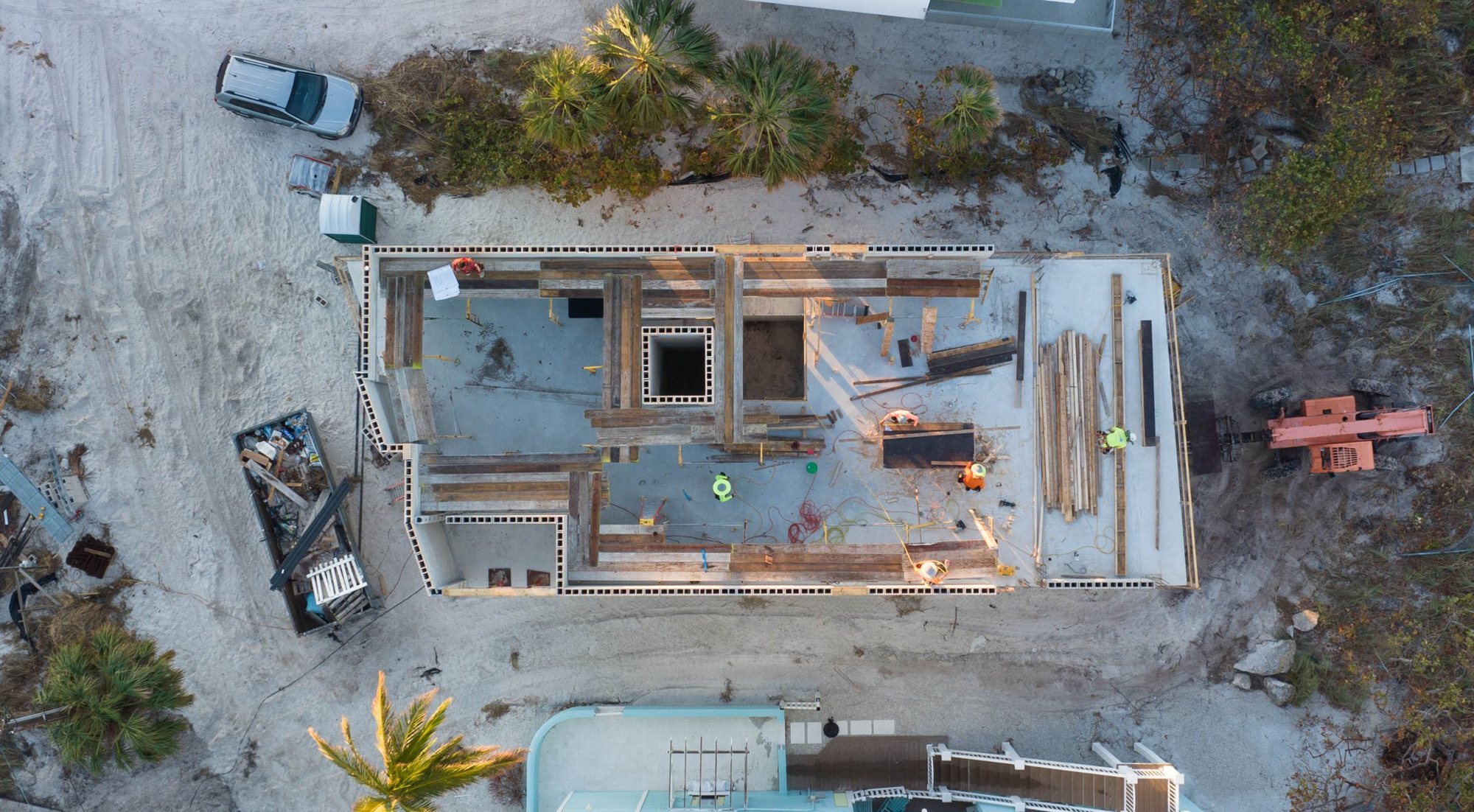 Overhead view of the crew forming the second floor walls and beams