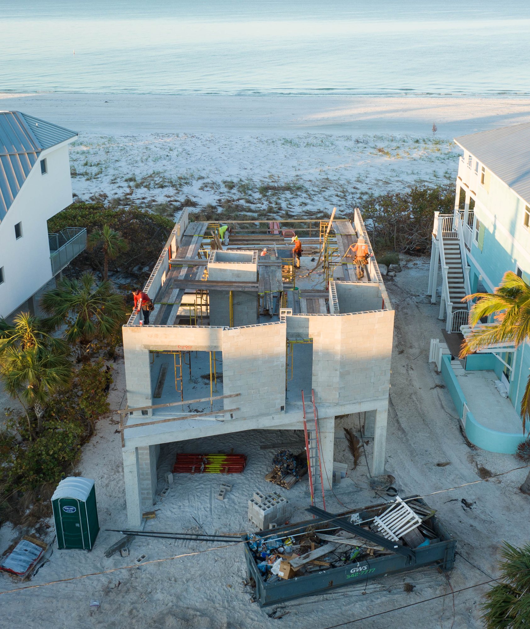 Aerial view of the crew on the upper walls, looking out to the Gulf