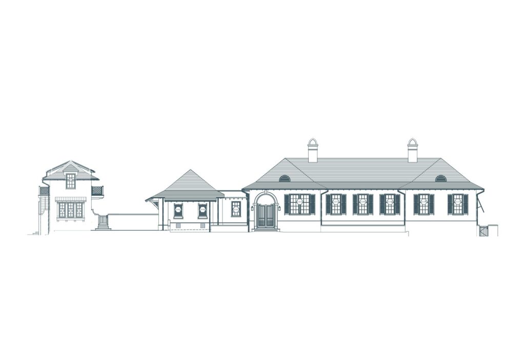 Front elevation of Snell Isle Residence, the main house with its arched entry and the two-story guest house beside it, by Buccellato Design & Architecture
